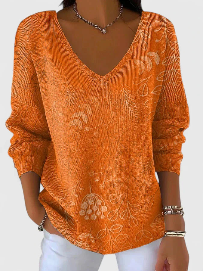 Calista | Elegant Knit Top with V-Neck and Floral Pattern in Vibrant Orange
