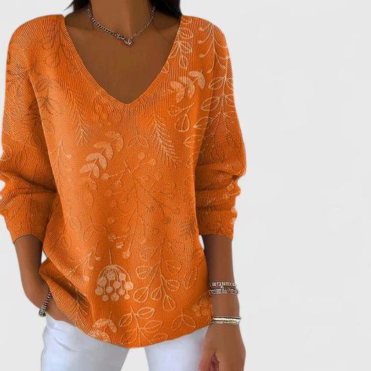 Calista | Elegant Knit Top with V-Neck and Floral Pattern in Vibrant Orange