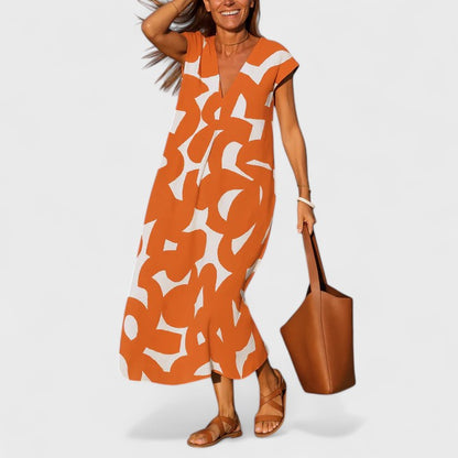 Calista | Black & White Abstract Flowing V-Neck Dress