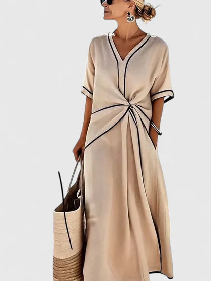 Calantha | Beige Elegant Dress with Black Trim
